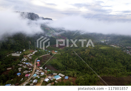 Landscape of Morning Mist with Mountain Layer at north of Thailand. mountain ridge and clouds in rural jungle bush forest 117801857