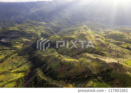 Landscape of Morning Mist with Mountain Layer at north of Thailand. mountain ridge and clouds in rural jungle bush forest Landscape of Morning Mist with Mountain Layer at north of Thailand. mountain ridge and clouds in rural jungle bush forest 117801862