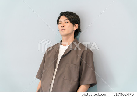 Male model in oversized shirt (broken heart, lethargic, listless, thinking, dull, depressed) 117802479