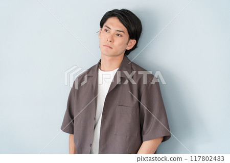 Male model in oversized shirt (broken heart, lethargic, listless, thinking, dull, depressed) 117802483