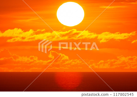 Amazing sun Beautiful light sunset or sunrise nature in golden sky over sea,Beautiful nature landscape background Amazing sun Beautiful light sunset or sunrise nature in golden sky over sea,Beautiful nature landscape background 117802545