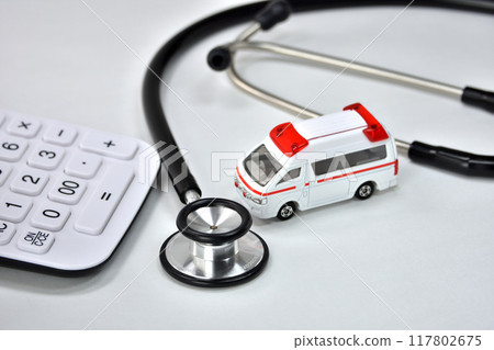 Stethoscope, calculator, medical expenses, medical insurance image 117802675