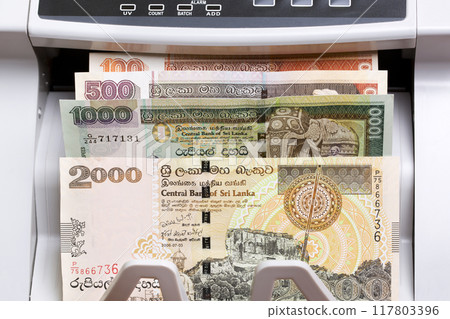 Old Sri Lankan rupee in the counting machine Old Sri Lankan rupee in the counting machine 117803396