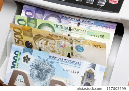 Philippine peso in the counting machine 117803399