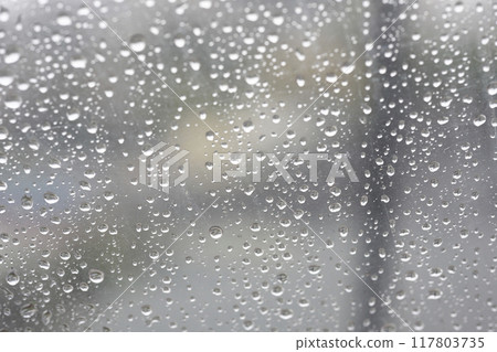 Raindrops on a vinyl umbrella 117803735