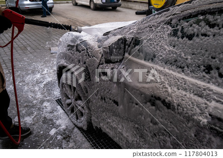 SUV Being Washed at Car Wash 117804013