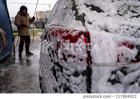 SUV Being Washed at Car Wash SUV Being Washed at Car Wash 117804022
