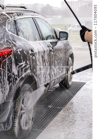 SUV Being Washed at Car Wash SUV Being Washed at Car Wash 117804095