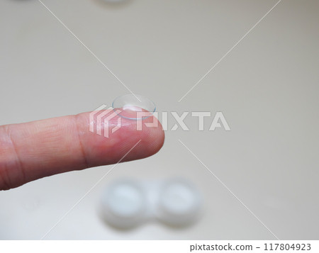 Contact lens on finger Contact lens on finger 117804923