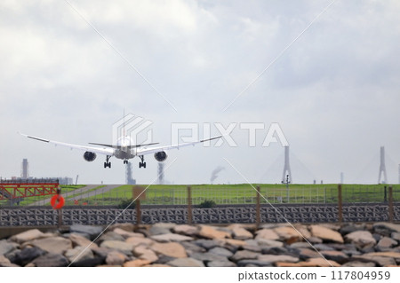 Passenger plane taking off and landing image 117804959