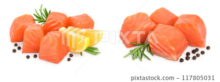 raw salmon piece cube with rosemary, lemon and peppercorn isolated on white background close up raw salmon piece cube with rosemary, lemon and peppercorn isolated on white background close up 117805031