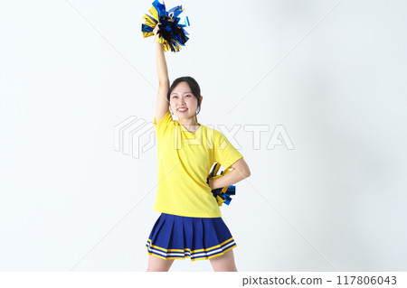 Cheerleader raising her right arm Cheerleader raising her right arm 117806043