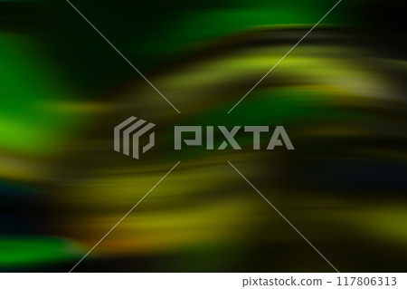 Abstract texture with flowing dark green and yellow wave patterns on a black background (effects and color processing material) 117806313