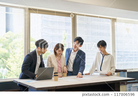 Office workers having a meeting in the office Office workers having a meeting in the office 117806596