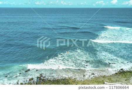 Aerial view the Group of surfers chilling out on the beach. Los Caracas beach, La Guaira - Venezuela. 117806664