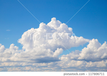 Blue sky with white clouds. Clouds in sky on sunny day 117806711