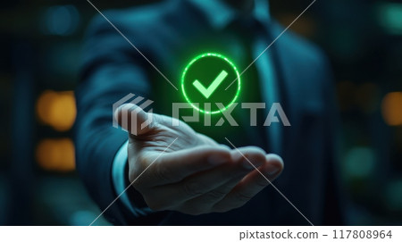 Businessman Offering a Green Checkmark Hologram Symbolizing Success and Approval in a Corporate Setting 117808964