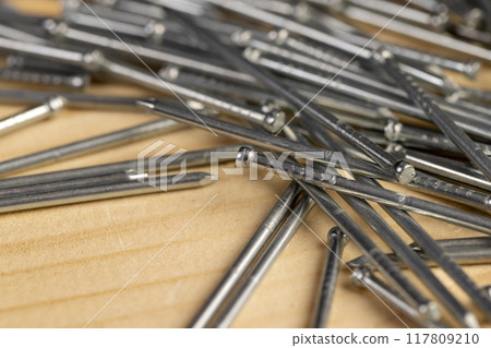nails with small caps for finishing work and decorations 117809210