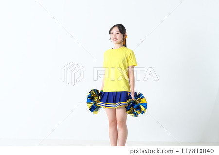 Cheerleader standing with a smile Cheerleader standing with a smile 117810040