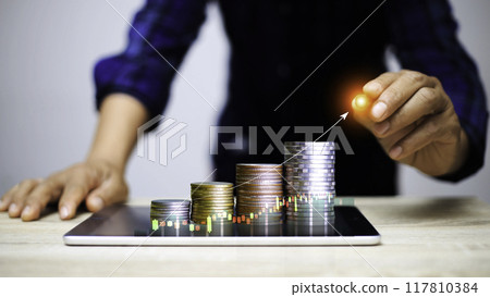 coin is placed as a graph showing the success of the income fund. Business success concept, wealth, investment, stock in the digital age. Digital transformation for next-generation technology. 117810384