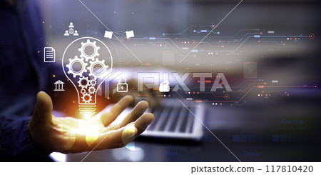 Businessman Touching Icon Bulb.Concept of Ideas for success.Concept with innovation inspiration.Success start from new ideas to innovative technology relying on information from the internet big data. 117810420