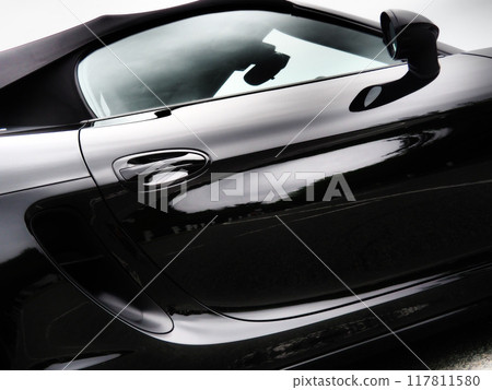 Shiny black sports car 117811580