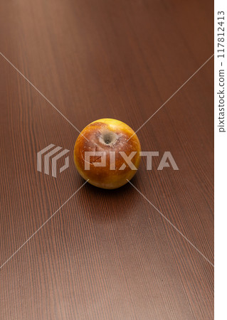 rotten apples isolated on white background. rotten apples isolated on white background. 117812413