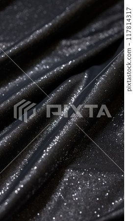 Glitter bokeh of satin fabric for background. Metallic textile close up 117814317