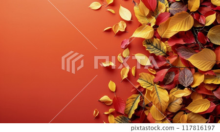 Fall Leaves and Pumpkins on Orange Background 117816197