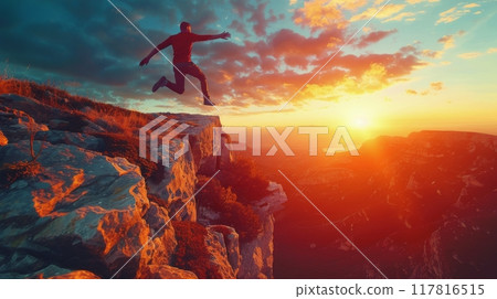 Man Jumps From Mountain Cliff During Sunset 117816515