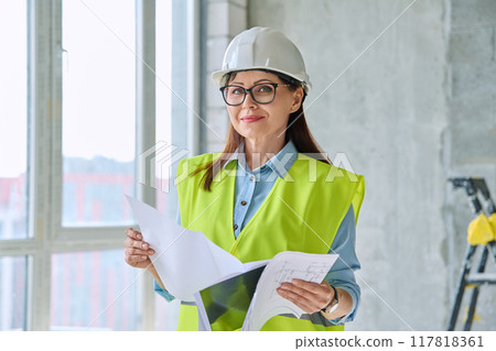 Portrait of woman builder engineer supervisor at construction Portrait of woman builder engineer supervisor at construction 117818361