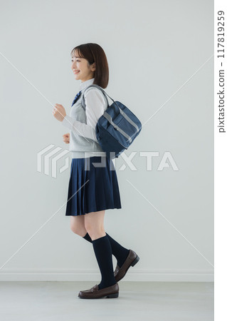 High school girl doing a fist pump High school girl doing a fist pump 117819259