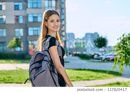 Outdoor portrait young teenager student female with backpack Outdoor portrait young teenager student female with backpack 117820417