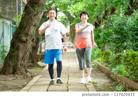 Senior couple doing running Senior couple doing running 117820833