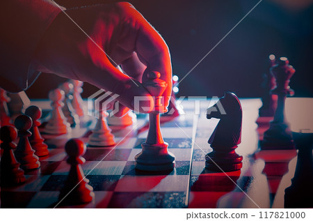 Businessman planning strategy with chess figures Businessman planning strategy with chess figures 117821000