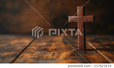 Wooden cross on rustic wooden surface 117821619