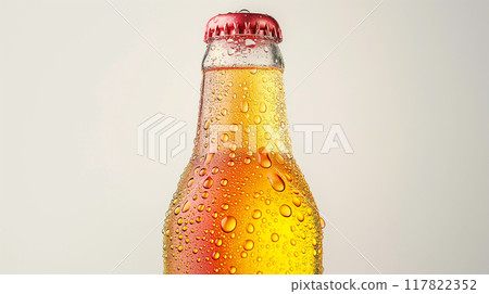 Cold Yellow Beverage in Glass Bottle with Condensation Cold Yellow Beverage in Glass Bottle with Condensation 117822352