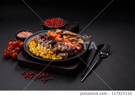 A colorful vegetarian dish consists of fish, beans, corn, mushrooms A colorful vegetarian dish consists of fish, beans, corn, mushrooms 117825310