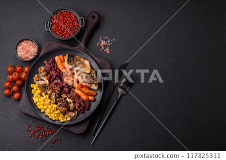 A colorful vegetarian dish consists of fish, beans, corn, mushrooms A colorful vegetarian dish consists of fish, beans, corn, mushrooms 117825311