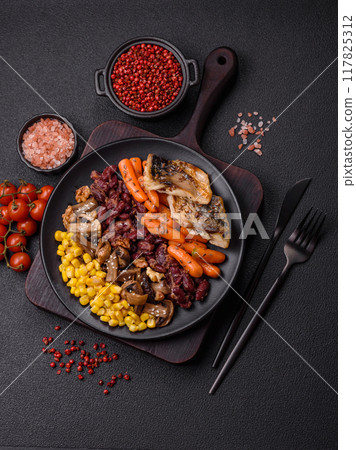 A colorful vegetarian dish consists of fish, beans, corn, mushrooms A colorful vegetarian dish consists of fish, beans, corn, mushrooms 117825312