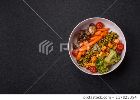 Colorful vegan vegetarian dish consists of tofu, broccoli, quinoa, mushrooms Colorful vegan vegetarian dish consists of tofu, broccoli, quinoa, mushrooms 117825354