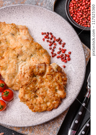 Delicious fried pork or chicken chops breaded with salt and spices 117825360