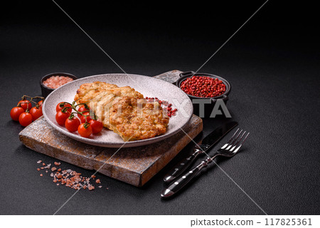 Delicious fried pork or chicken chops breaded with salt and spices 117825361