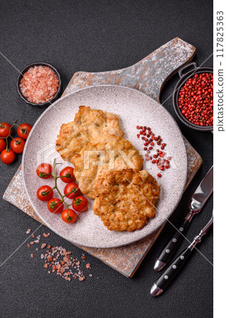 Delicious fried pork or chicken chops breaded with salt and spices Delicious fried pork or chicken chops breaded with salt and spices 117825363