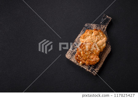 Delicious fried pork or chicken chops breaded with salt and spices Delicious fried pork or chicken chops breaded with salt and spices 117825427