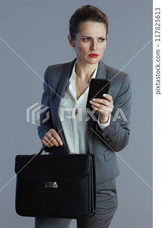 modern business woman isolated on gray background 117825613