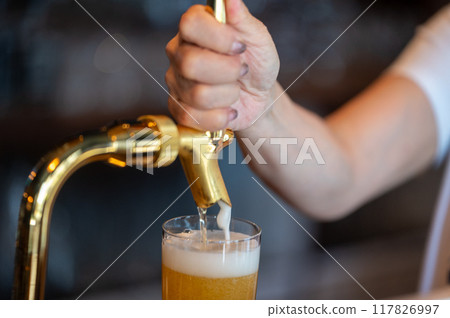 The moment of pouring beer 117826997