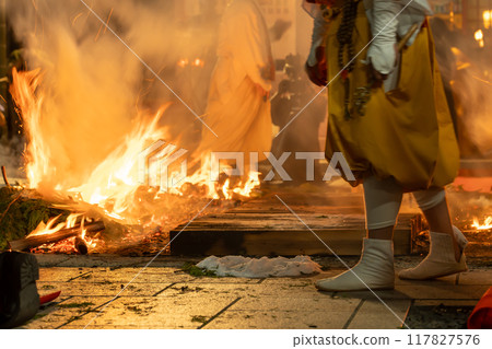 A monk guides the Toka Kannon fire walking ceremony held at Tsu Kannon in Tsu City, Mie Prefecture 117827576
