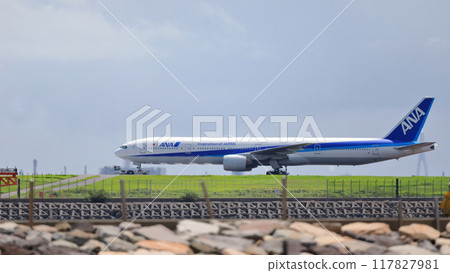Passenger plane taking off and landing image 117827981