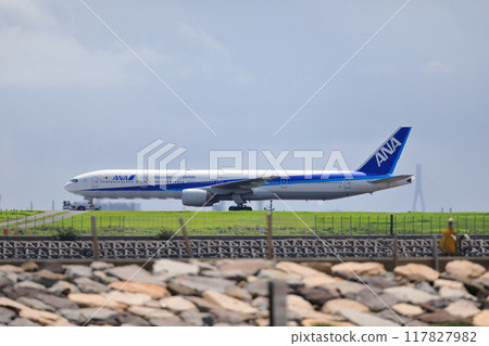 Passenger plane taking off and landing image 117827982